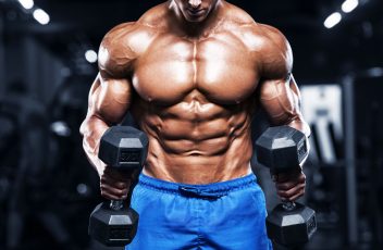 mh-muscular-man-working-out-in-gym-strong-male-torso-royalty-free-image-924491214-1557166711